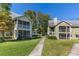 Charming two-story apartment with screened in porch and lush green lawn at 3721 S Lake Orlando Pkwy # 2, Orlando, FL 32808