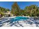 Inviting community pool featuring sun loungers and lush tropical landscaping at 3721 S Lake Orlando Pkwy # 2, Orlando, FL 32808