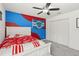 bedroom with full-size bed and Detroit sports theme at 3969 Lone Eagle Pl, Sanford, FL 32771