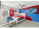 bedroom with full-size bed and Detroit sports theme at 3969 Lone Eagle Pl, Sanford, FL 32771