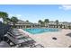 Community pool with plenty of lounge chairs at 3999 Night Heron Dr, Sanford, FL 32773