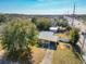 House with yellow door and driveway, aerial view at 4400 Southmore Dr, Orlando, FL 32812