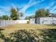 Large backyard with grassy area and privacy fence at 4400 Southmore Dr, Orlando, FL 32812