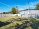 Large backyard with grassy area and privacy fence at 4400 Southmore Dr, Orlando, FL 32812