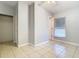 Spacious bedroom with tile floor and a closet at 4400 Southmore Dr, Orlando, FL 32812