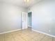 Bright bedroom with tile floors and closet at 4400 Southmore Dr, Orlando, FL 32812