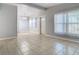 Dining room with tiled floor, chandelier, and view to kitchen at 4400 Southmore Dr, Orlando, FL 32812