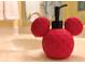 A red Mickey Mouse-shaped soap dispenser adds a playful touch to the bathroom at 4560 Yellowgold E Rd # 108, Kissimmee, FL 34746