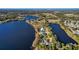 Aerial view of lakefront community with various homes at 491 Carolyn Dr, Oviedo, FL 32765