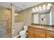 Updated bathroom with a walk-in shower and wood vanity at 491 Carolyn Dr, Oviedo, FL 32765