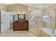 Elegant bathroom with a large walk-in shower and soaking tub at 491 Carolyn Dr, Oviedo, FL 32765