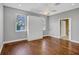 Bedroom with wood floors and a built-in murphy bed at 491 Carolyn Dr, Oviedo, FL 32765