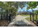 Private gated entry to the property at 491 Carolyn Dr, Oviedo, FL 32765