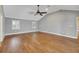 Spacious main bedroom with high ceilings and wood-look tile floors at 491 Carolyn Dr, Oviedo, FL 32765