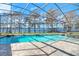 Spacious screened pool overlooking the lake at 491 Carolyn Dr, Oviedo, FL 32765