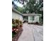 House exterior showcasing walkway and landscaping at 505 Harvard Pl, Apopka, FL 32703