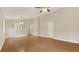 Bright living room with hardwood floors and ceiling fan at 505 Harvard Pl, Apopka, FL 32703