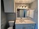 Updated bathroom with white vanity, quartz countertop, and modern fixtures at 5538 Pga Nw Blvd # 5025, Orlando, FL 32839