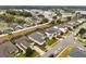 Aerial view of residential homes with pools, showcasing a neighborhood's features at 627 Copeland Dr, Haines City, FL 33844