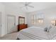 Bedroom with wood furniture and window with blinds at 627 Copeland Dr, Haines City, FL 33844