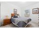 Guest bedroom with wood furniture and window at 627 Copeland Dr, Haines City, FL 33844