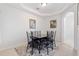 Dining room with a glass-top table and six chairs at 627 Copeland Dr, Haines City, FL 33844