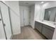 Modern bathroom with double vanity and walk-in shower at 768 Staffora St, Haines City, FL 33844