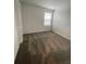 Simple bedroom with carpet flooring and window at 768 Staffora St, Haines City, FL 33844