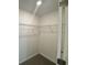 Walk-in closet with wire shelving at 768 Staffora St, Haines City, FL 33844