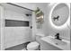 Modern bathroom with a walk-in shower and floating vanity at 7729 Country Pl, Winter Park, FL 32792