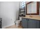 Bathroom with gray vanity, a toilet, and a shelf at 820 Spring Oak Cir, Orlando, FL 32828