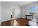 Bedroom with wood floors, a desk, and an ensuite bathroom at 820 Spring Oak Cir, Orlando, FL 32828