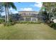 Two-story house with screened lanai and large backyard at 820 Spring Oak Cir, Orlando, FL 32828