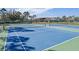 Two pickleball courts with green and blue surface, surrounded by fence at 820 Spring Oak Cir, Orlando, FL 32828