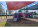 Colorful playground with shade structures and play equipment for  at 820 Spring Oak Cir, Orlando, FL 32828