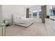 Bright bedroom with a king-size bed, large windows, and ample closet space at 8361 Ludington Cir, Orlando, FL 32836