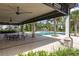 Covered patio area overlooking the community pool at 8361 Ludington Cir, Orlando, FL 32836