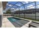 Inviting screened pool with ample deck space at 8361 Ludington Cir, Orlando, FL 32836