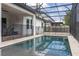 Resort-style pool with screened enclosure at 8361 Ludington Cir, Orlando, FL 32836