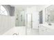 Bright and airy bathroom featuring a separate glass shower and soaking tub at 862 Shriver Cir, Lake Mary, FL 32746