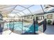 Enclosed pool featuring a screened-in enclosure, safety fence, and patio at 862 Shriver Cir, Lake Mary, FL 32746