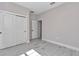 The bedroom has hard surface floors and a closet with sliding doors at 9095 Sw 125Th Ter, Dunnellon, FL 34432