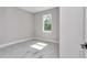 This bedroom is bright and has a window view and hard surface floors at 9095 Sw 125Th Ter, Dunnellon, FL 34432