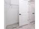 White closet with wire shelving and a door at 9095 Sw 125Th Ter, Dunnellon, FL 34432