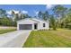 Charming single-story home showcasing a well-manicured lawn and a classic design at 9095 Sw 125Th Ter, Dunnellon, FL 34432