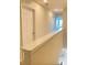 Upstairs hallway with doors to bedrooms and closets at 1100 Pavia Dr, Apopka, FL 32703