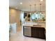 Open kitchen with island, stainless steel appliances, and granite countertops at 1100 Pavia Dr, Apopka, FL 32703