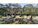 Aerial view of a community of homes with lush landscaping at 140 Stratford Ct, Haines City, FL 33844