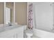 Clean bathroom with shower/tub combo and updated vanity at 140 Stratford Ct, Haines City, FL 33844