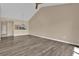 Living room with gray vinyl flooring and high ceilings at 140 Stratford Ct, Haines City, FL 33844